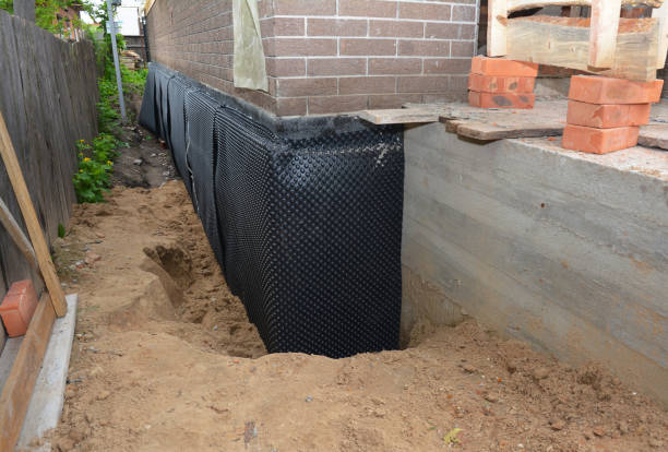 Happy homeowners after waterproofing job in Streetsboro
